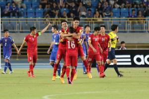 Vietnam (in red) celebrate after a last-gasp goal see them clinch a narrow 2-1 win over Chinese Taipei in their joint World Cup-Asian Cup Group F qualifier in Taipei on 8 September. (Photo Credit: Chinese Taipei Football Association)
